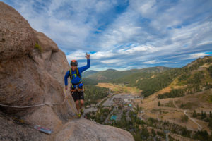 Adrian Ballinger climbing the Tahoe Via Ferrata with views of Squaw Valley