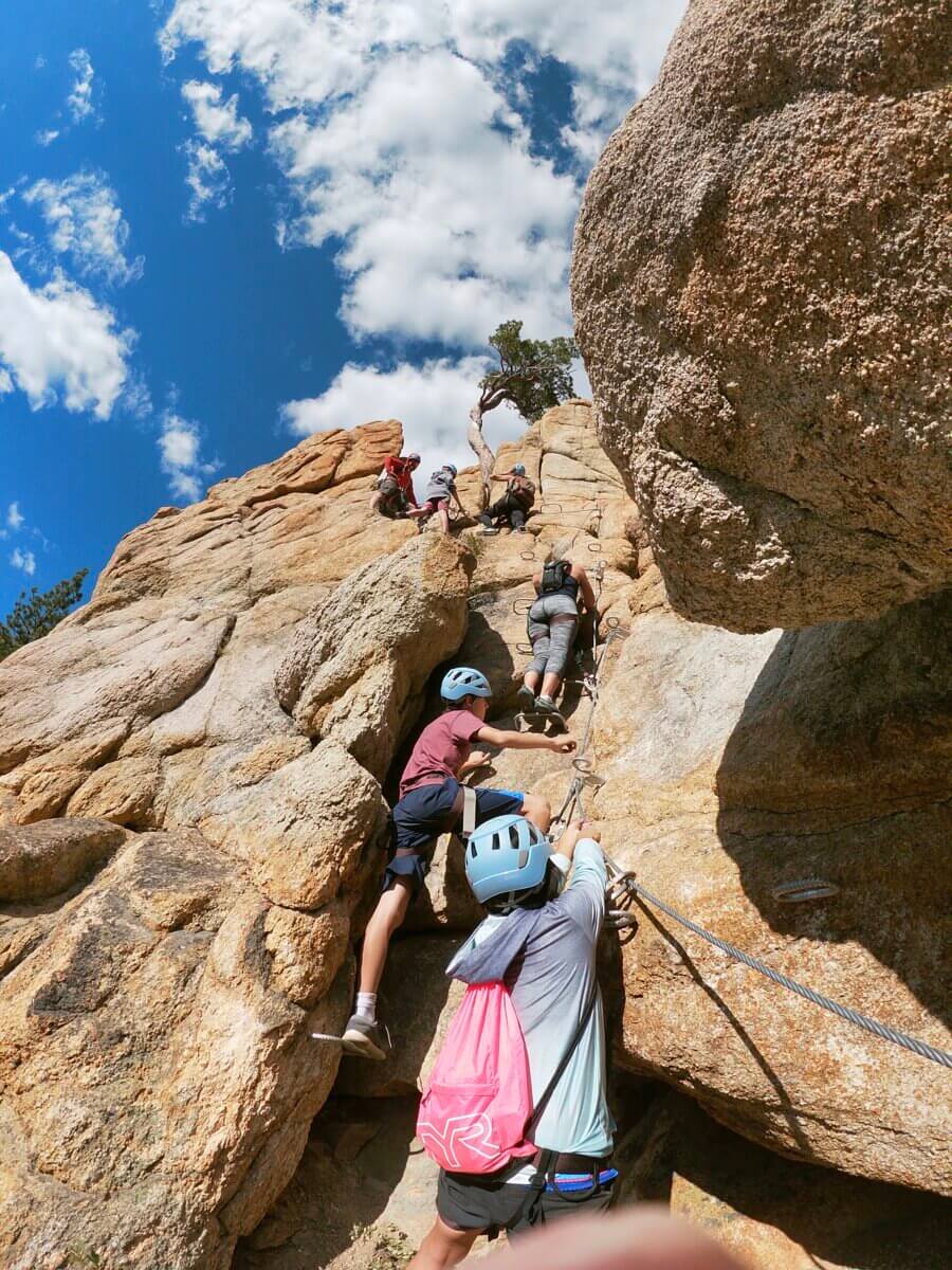 A family of climbers on the Tahoe Via Ferrata Palisades Tahoe and Olympic Valley, CA. One of the best Lake Tahoe adventures!