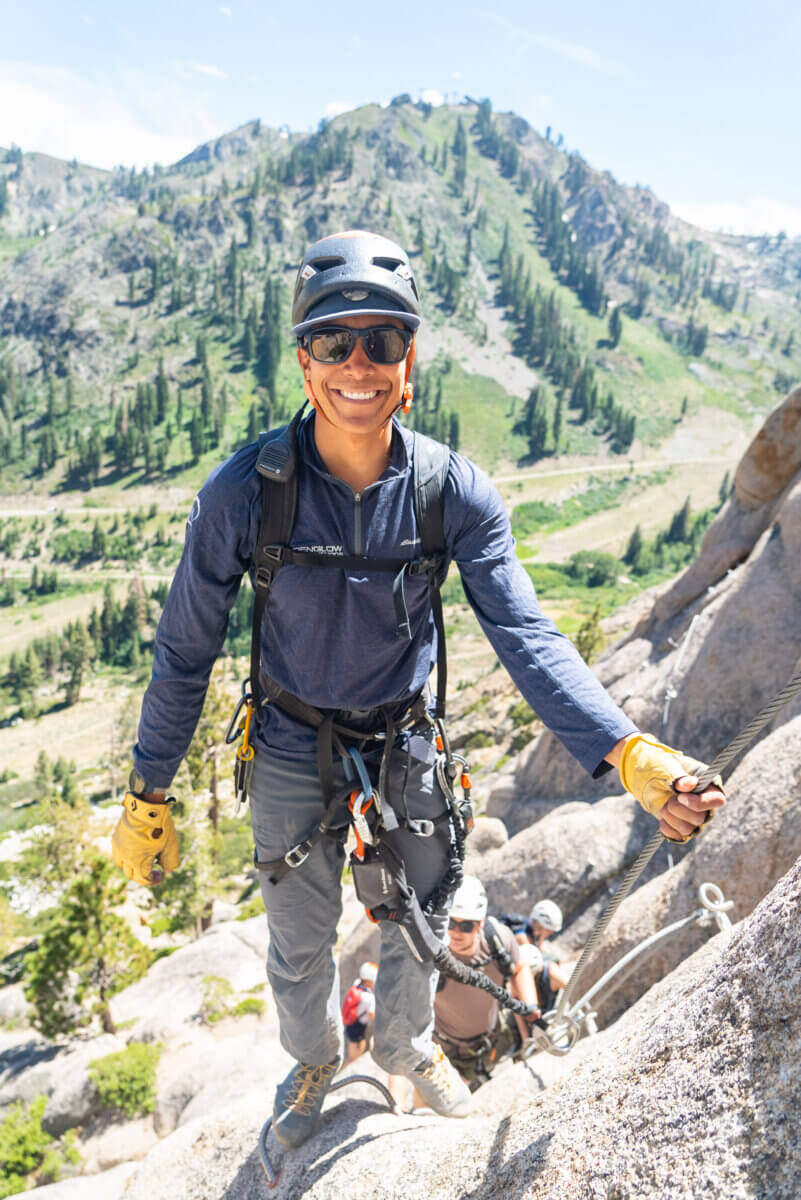 Guide Isaac Laredo guiding a group on the Tahoe Via Ferrata at Palisades Tahoe in Olympic Valley. One of the best Lake Tahoe adventures!