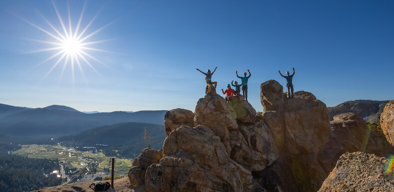 Climbers enjoy the sunrise on the Tahoe Via Ferrata