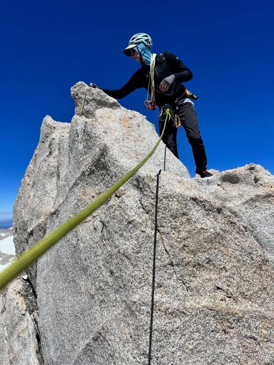 A client climbing in the High Sierras during a guided alpine climbing course with Alpenglow Expeditions.